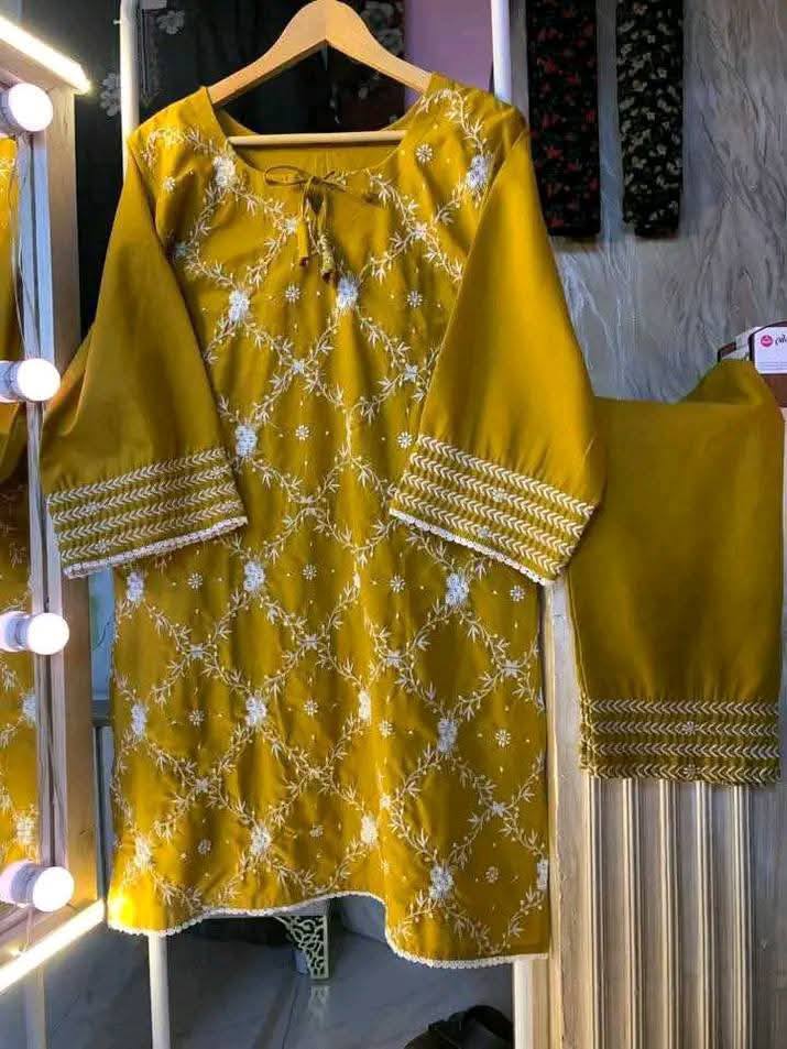 Mustard yellow dress with intricate white patterns Code 316