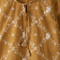 Mustard yellow dress with intricate white patterns Code 316